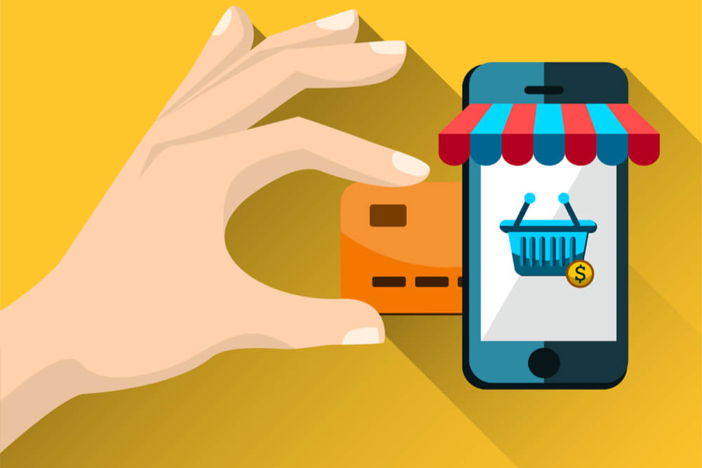 ilustraçao de tela de smartphone mostrando cesta de compras e cartao de credito ao lado, simbolizando compras online